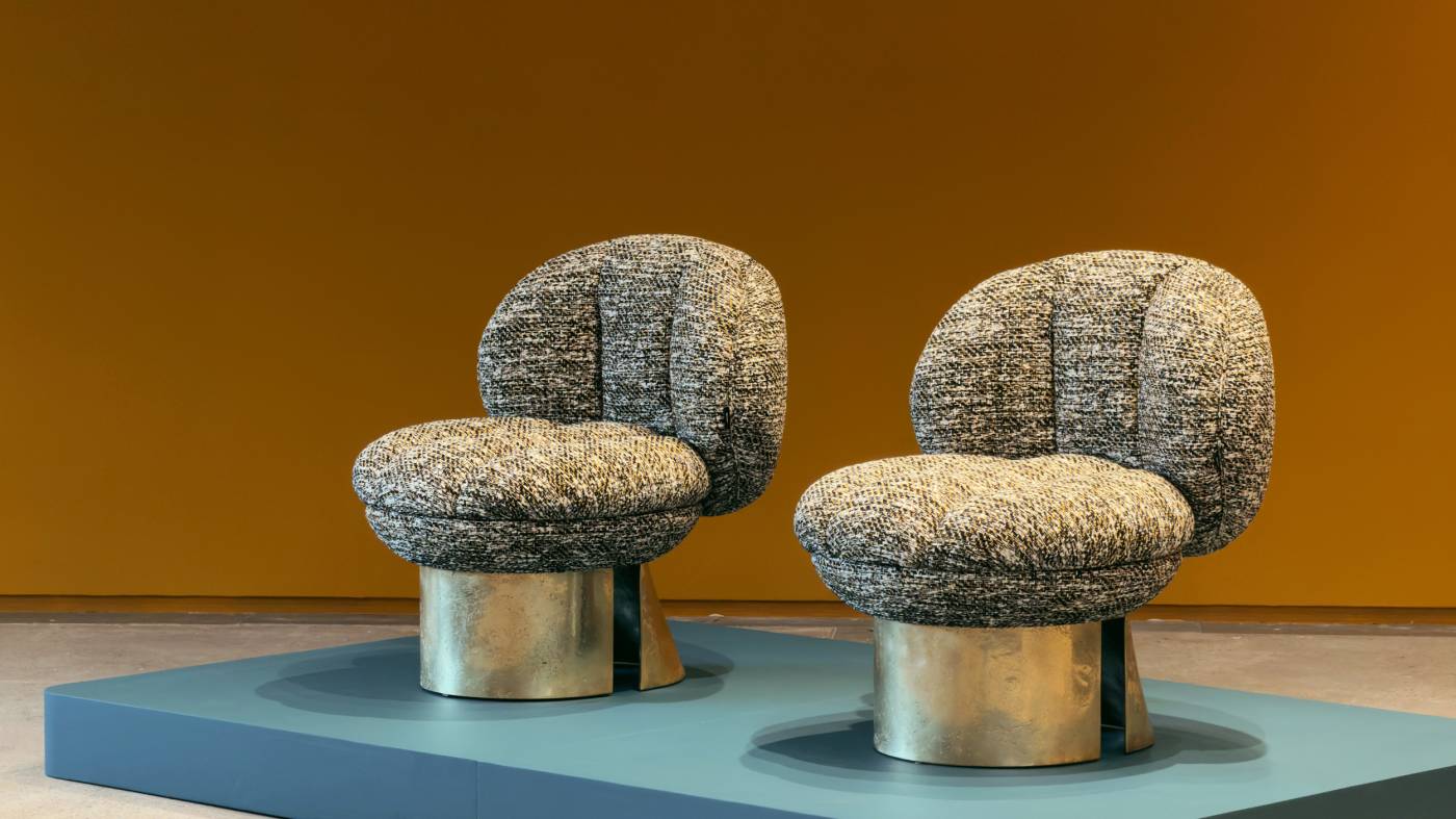 Pair of HESSENTIA upholstered Coco armchairs with textured fabric and metal bases at Firma Casa