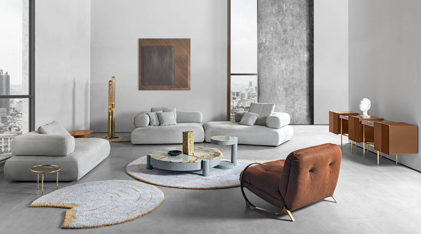 Cholet modular sofa with light upholstery in a contemporary living interior with multiple seating elements