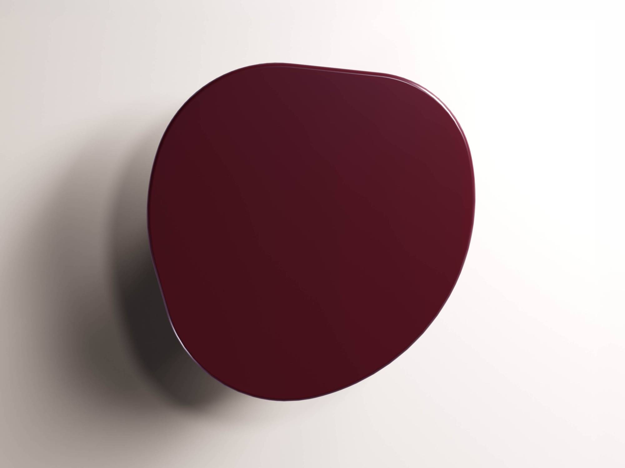 Top view of Ovoo dining table with irregular rounded amaranto surface