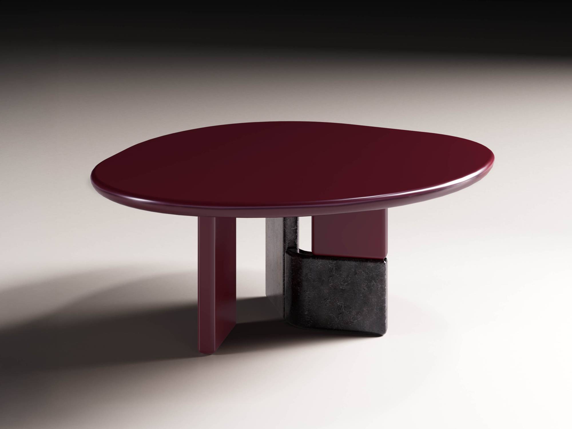 Ovoo dining table with glossy amaranto top and contrasting sculptural base