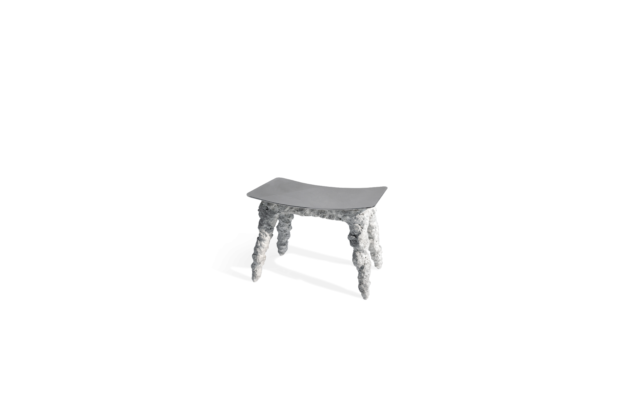 HESSENTIA Blade pouf with organic form and textured sculptural structure